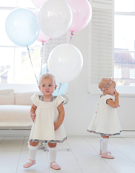 twins babies wearing The Diana Collection