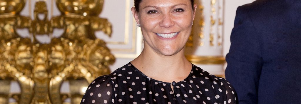 Crown Princess Victoria of Sweden wearing a polka dot dress