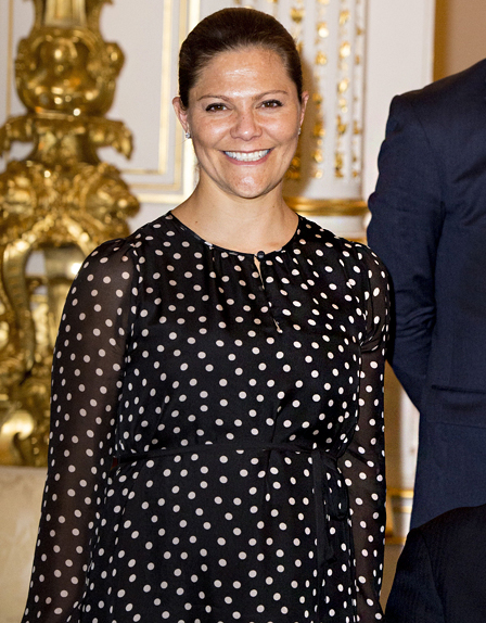 Crown Princess Victoria of Sweden wears a polka dot silk maternity dress by Seraphine