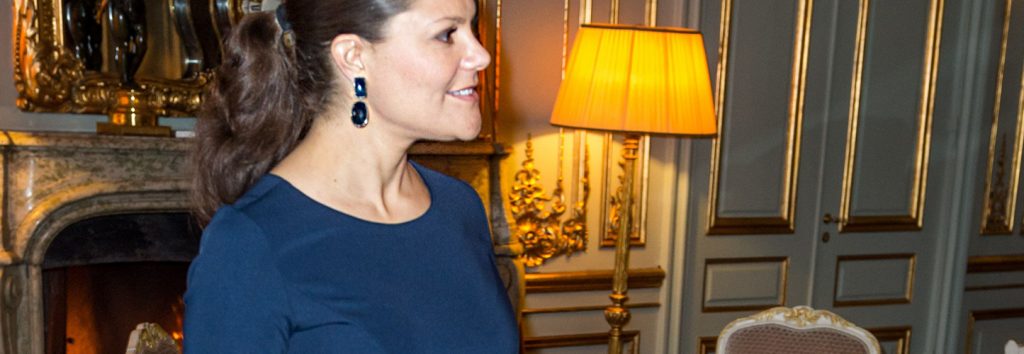 Crown Princess Victoria of Sweden wearing a midnight blue Seraphine maternity dress