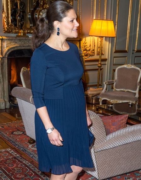 Pregnant Crown Princess Victoria of Sweden wearing Seraphine maternity dress