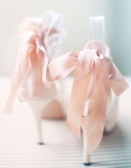 High heels with pink ribbons