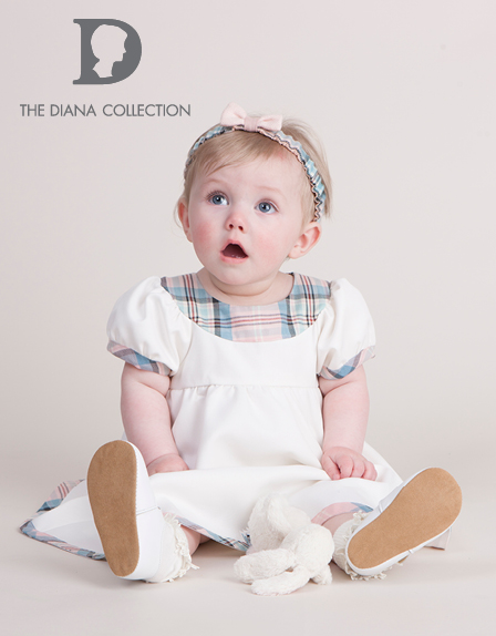 Diana Award: Cute baby wears adorable baby dress by The Diana Collection