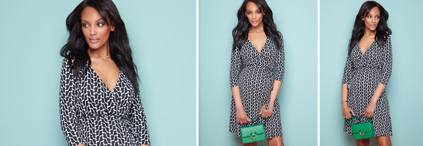 Pregnant model wears Seraphine printed maternity dress
