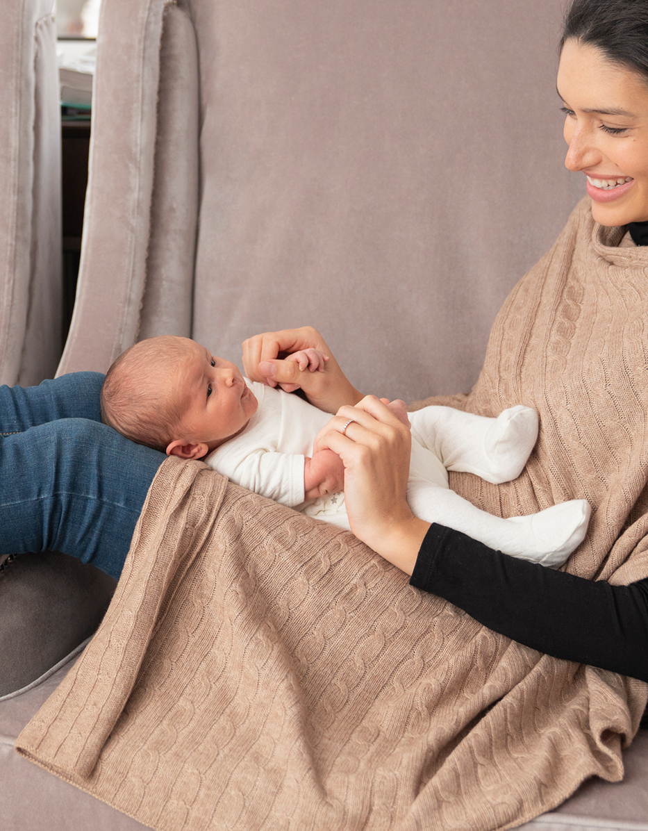 Mum & newborn baby with the Seraphine cable knit shawl