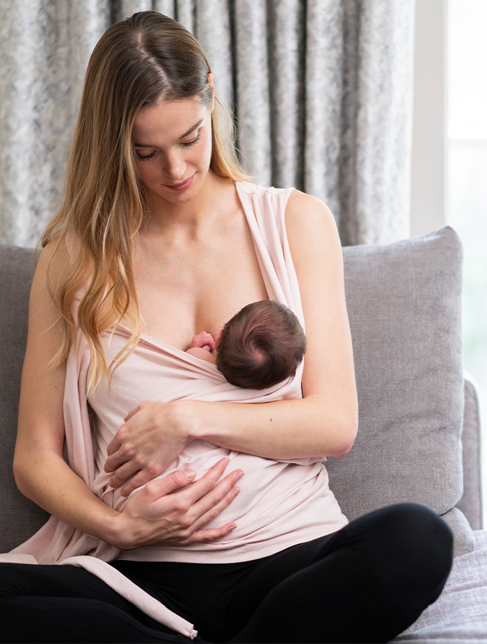 World Breastfeeding Week - mum nursing her baby in the seraphine skin to skin top